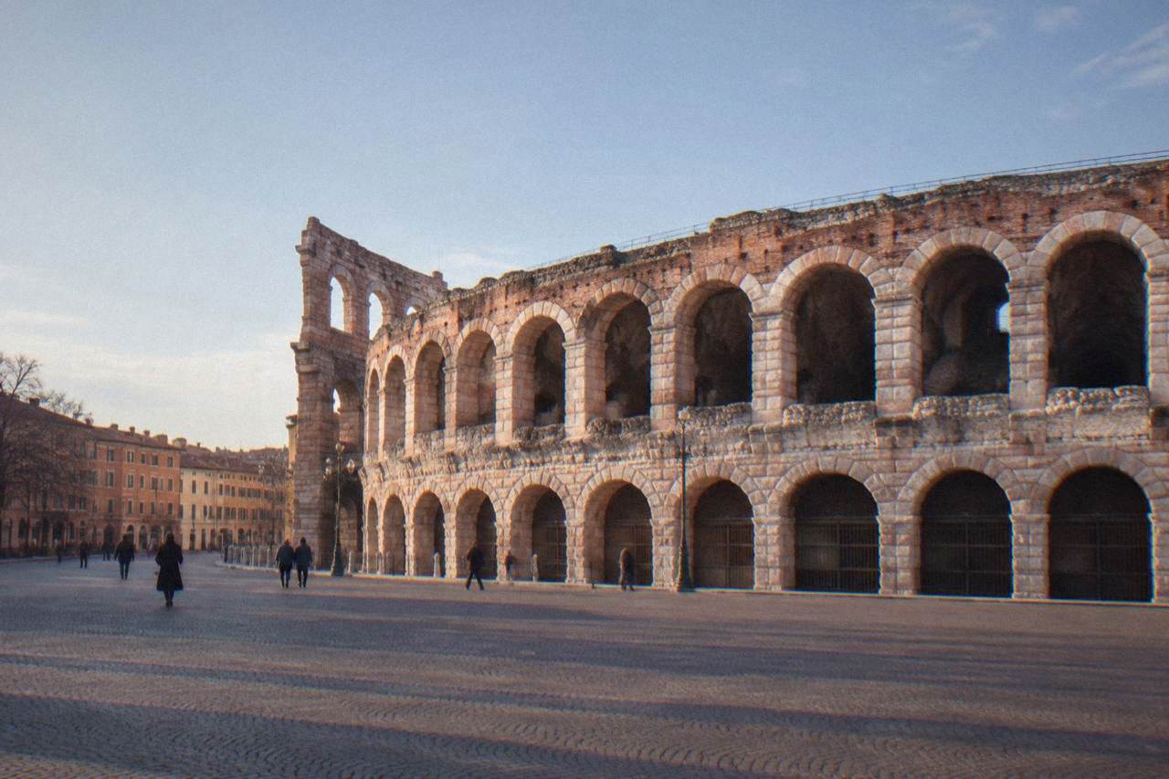 The Roman Arena of Verona seen from Piazza Bra in late afternoon light