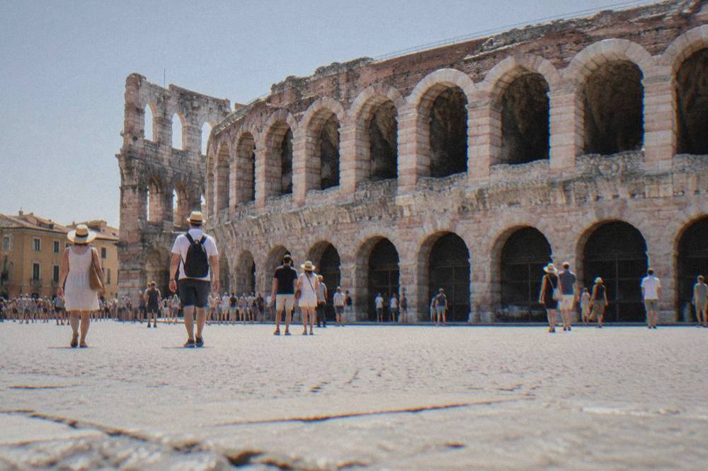 The Verona Arena amphitheatre seen from Piazza Bra on a bright morning