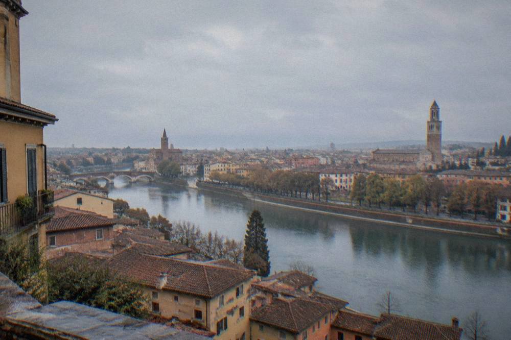 Rooftops and the Adige river bending through central Verona