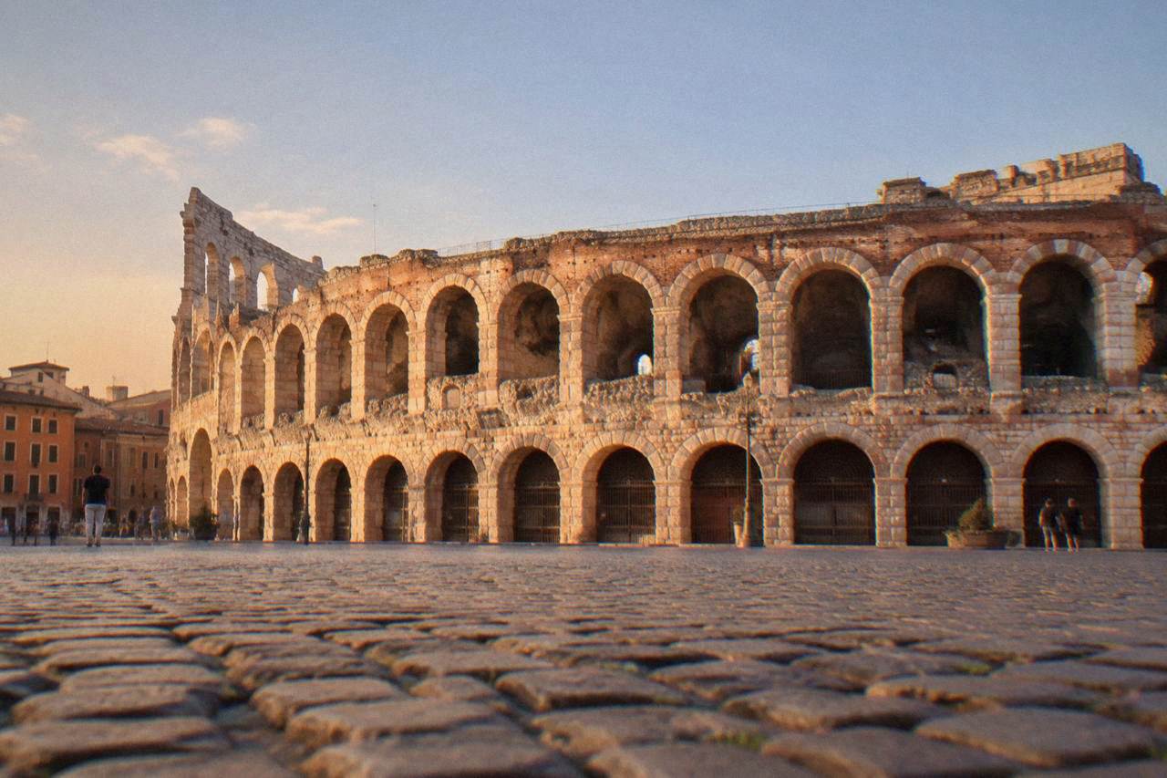 The Roman Arena of Verona seen from Piazza Bra at golden hour