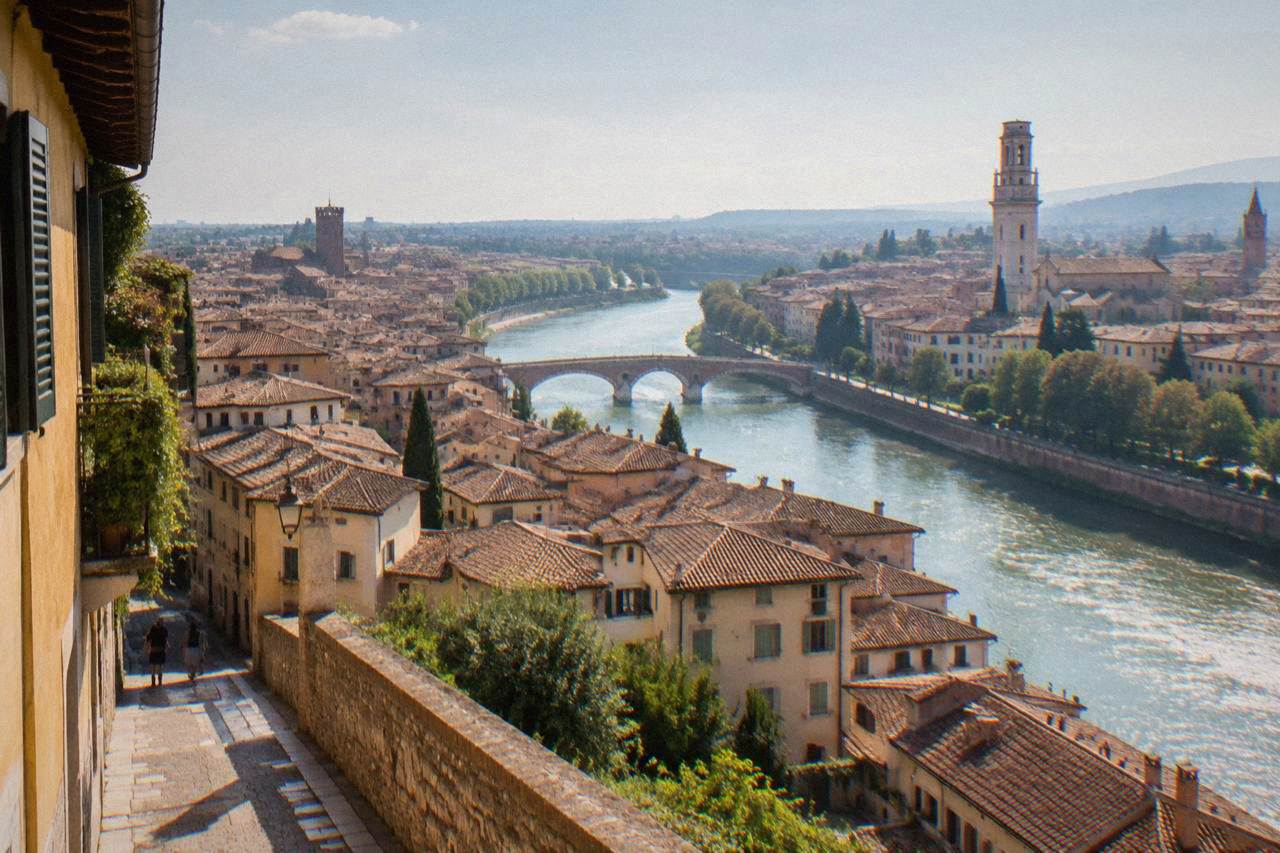 View over Verona's rooftops and the Adige river bending through the historic centre