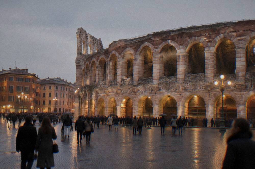 Evening crowds gathered in Piazza Bra outside the lit facade of the Arena