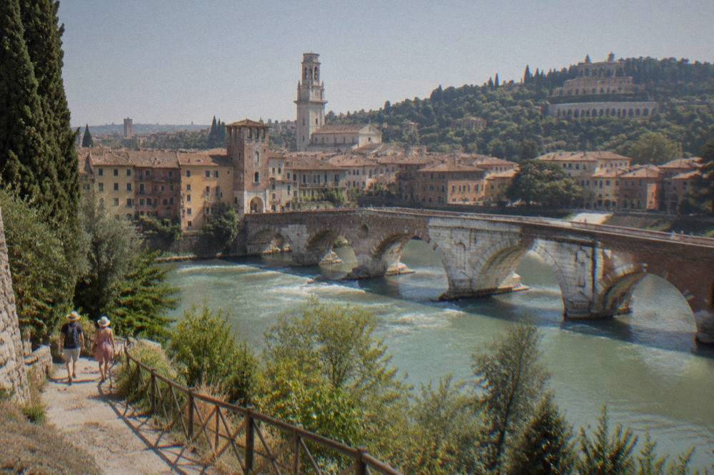 The Ponte Pietra and the Roman theatre seen from the hillside path below Castel San Pietro