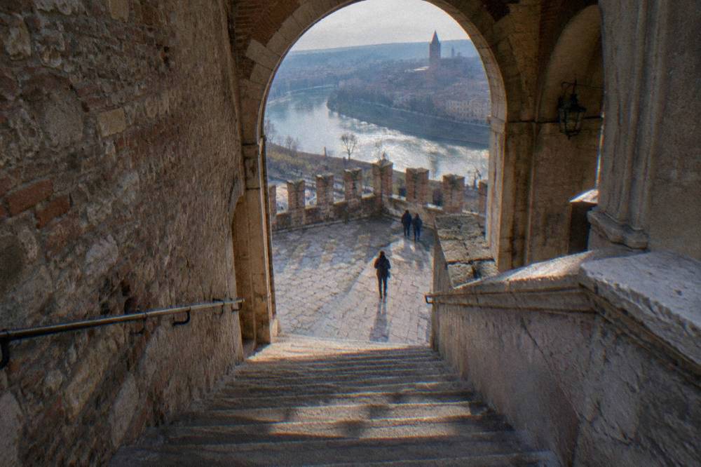 Stone staircase and archway inside the castle museum in Verona
