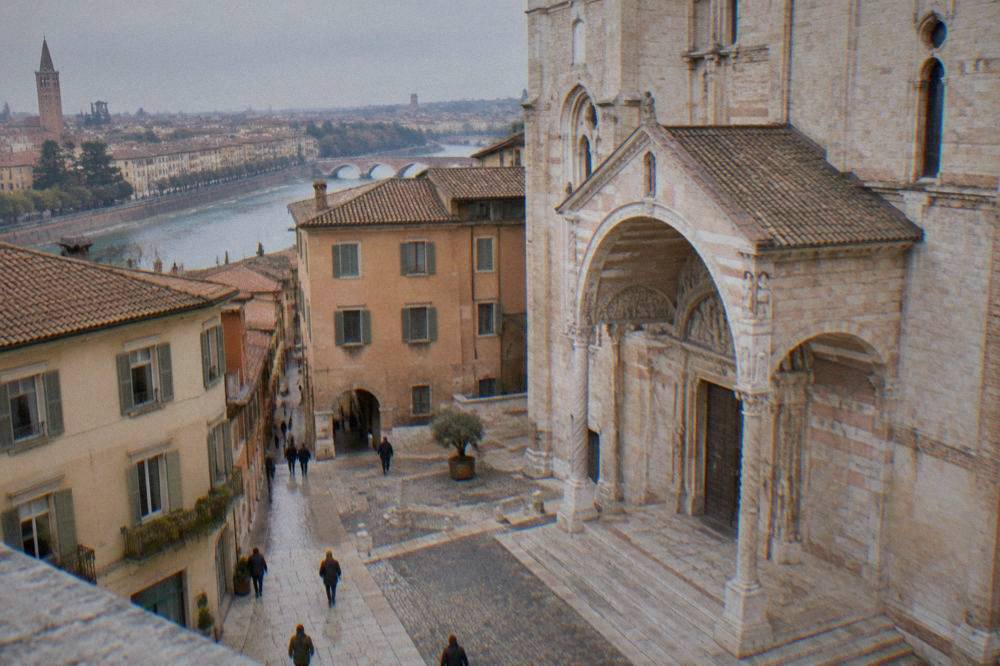 The carved portal and porch of Verona Cathedral with its columned canopy