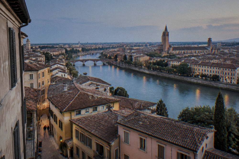 Autumn light on the rooftops and bell towers of central Verona seen from above