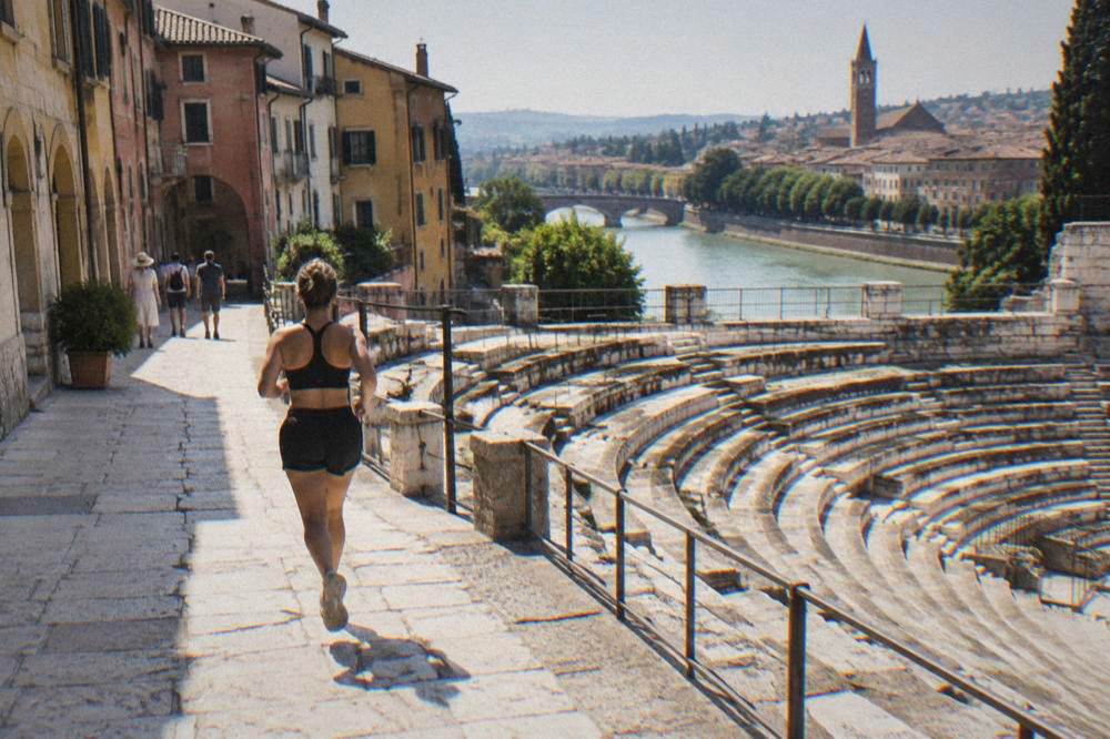 Curved stone seating of a Roman theatre on a hillside