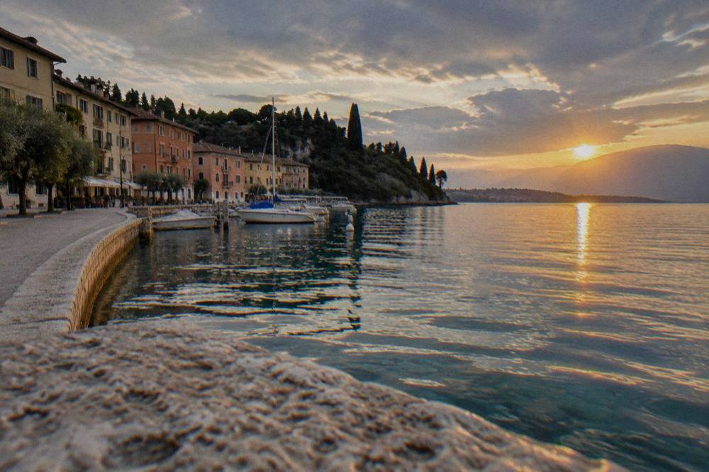 Sunset light over Lake Garda with the Bardolino shoreline silhouetted