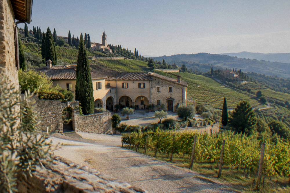 Historic villa with arched courtyard set among vineyards in Valpolicella