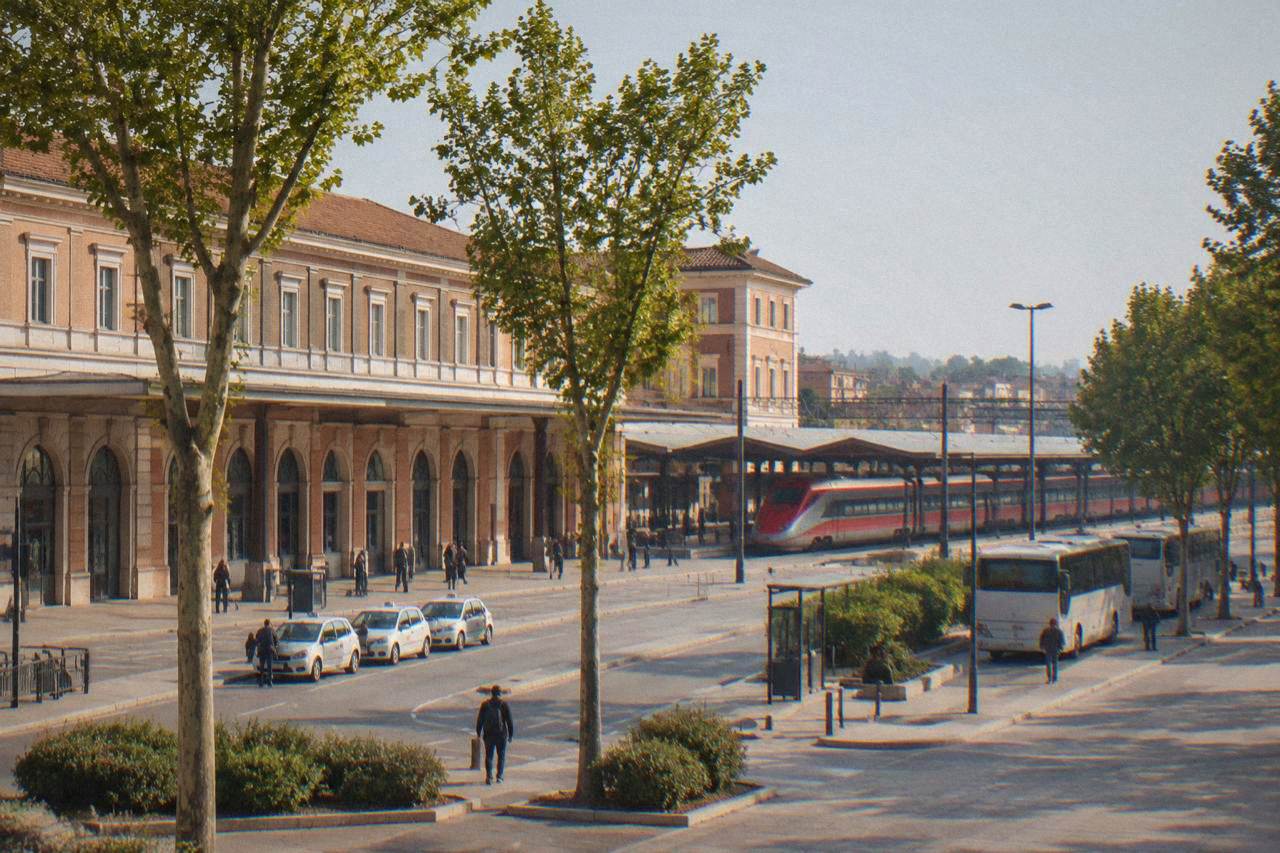 High speed train standing at a platform in an Italian railway station