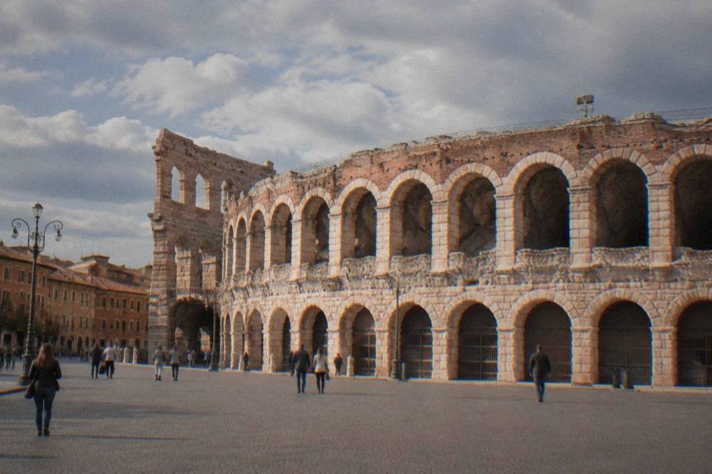 The Roman Arena of Verona seen from Piazza Bra in daylight