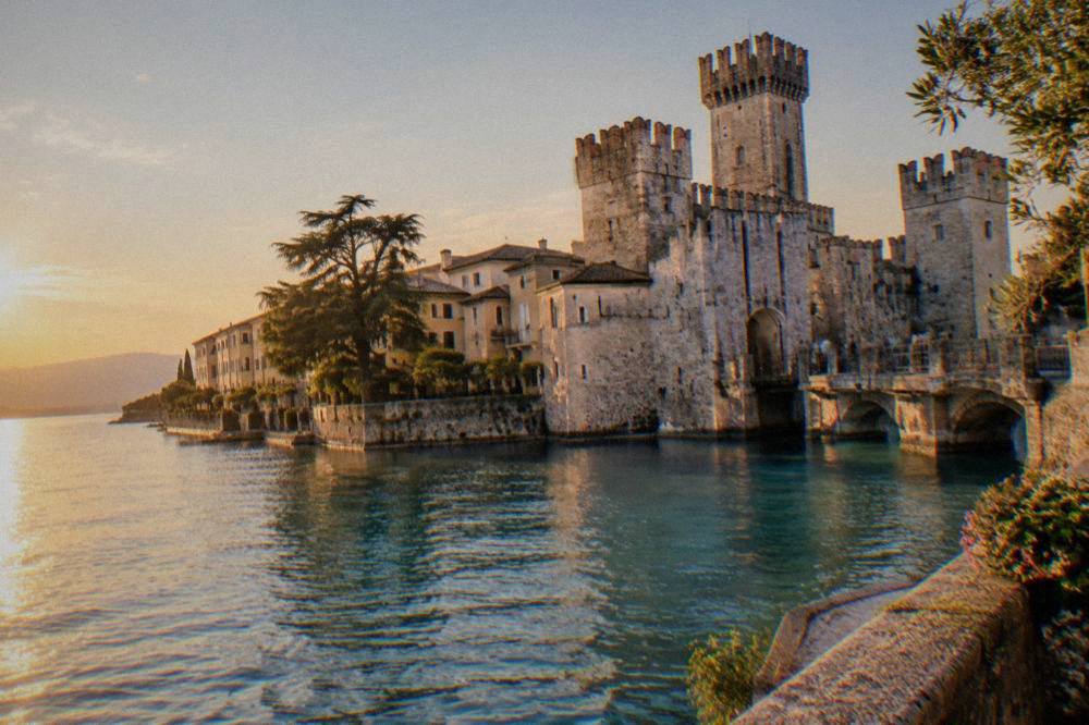 The lakeside town of Sirmione on Lake Garda with its castle tower above the water