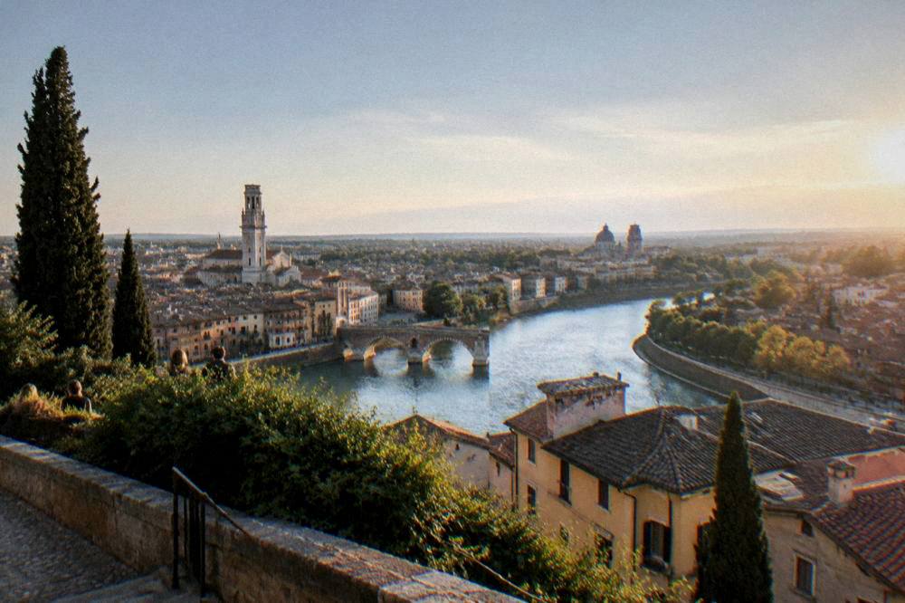 View over Verona rooftops and the Adige river bend from a hillside terrace