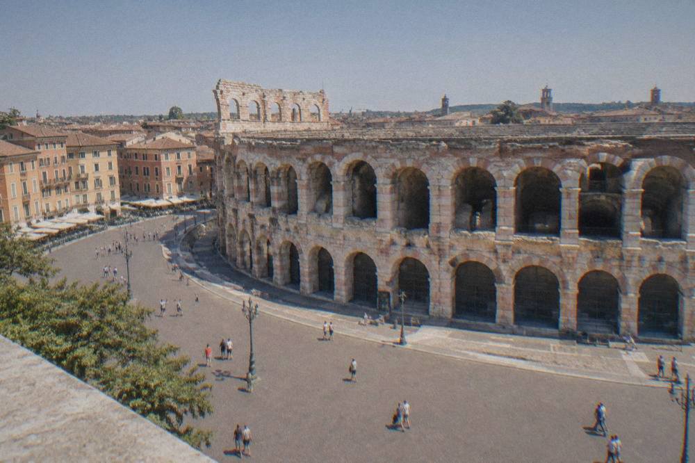 The Roman Arena of Verona seen from Piazza Bra on a bright morning