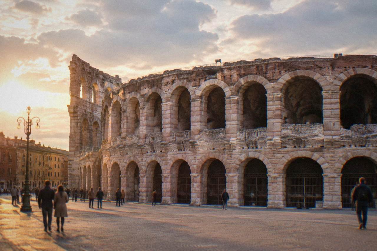 The Roman Arena of Verona seen from Piazza Bra at golden hour