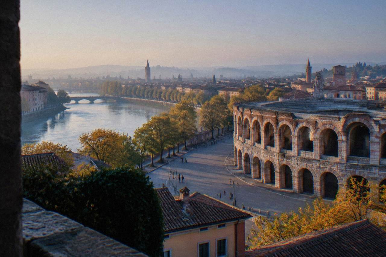 Autumn view over Verona rooftops with the Arena and the Adige river in soft morning light