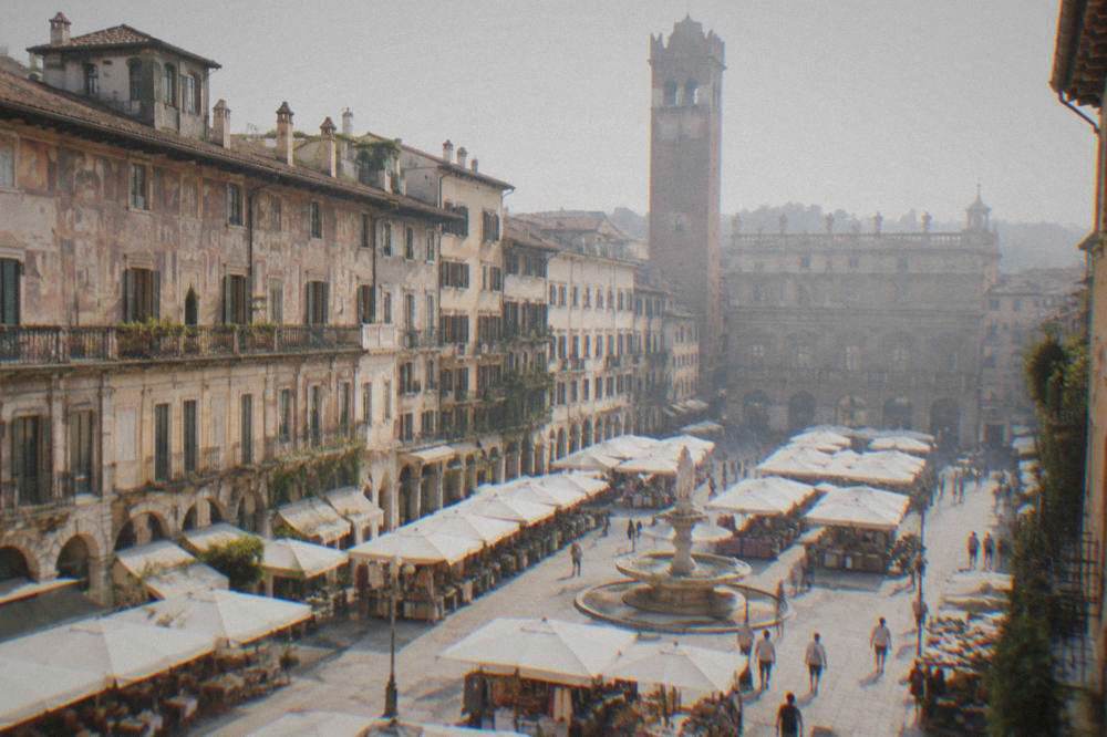 Market stalls and frescoed building facades around Piazza delle Erbe in Verona