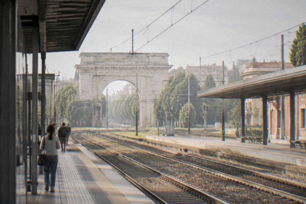 Verona Porta Nuova railway station platforms under a cloudy sky