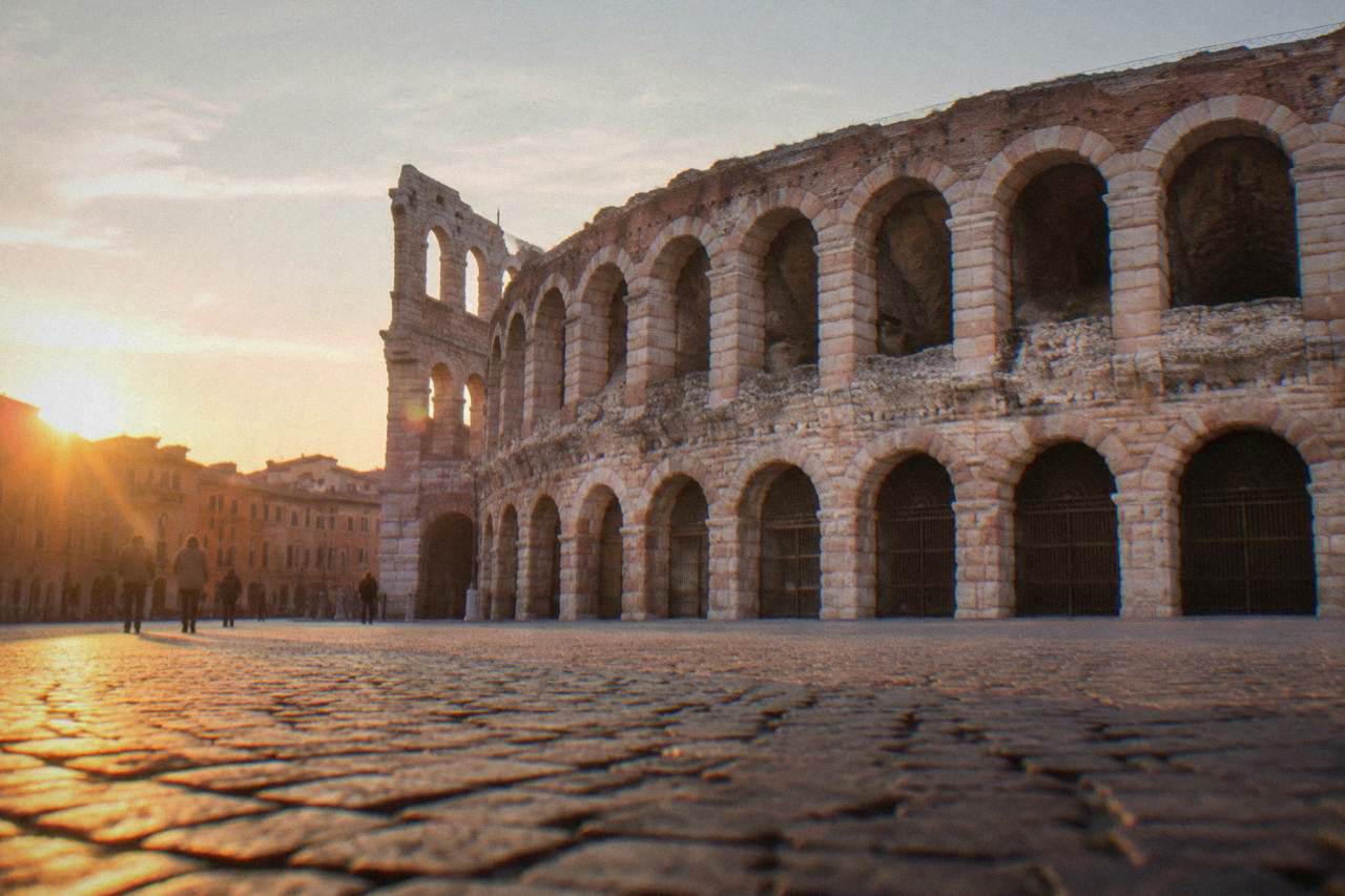 The Roman Arena of Verona seen from Piazza Bra at golden hour
