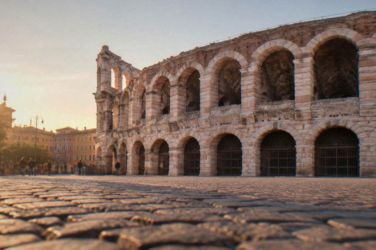 The Roman Arena of Verona seen from Piazza Bra in morning light