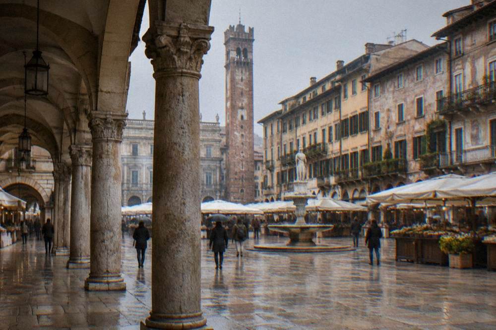 Covered arcade of an old stone building in soft grey light