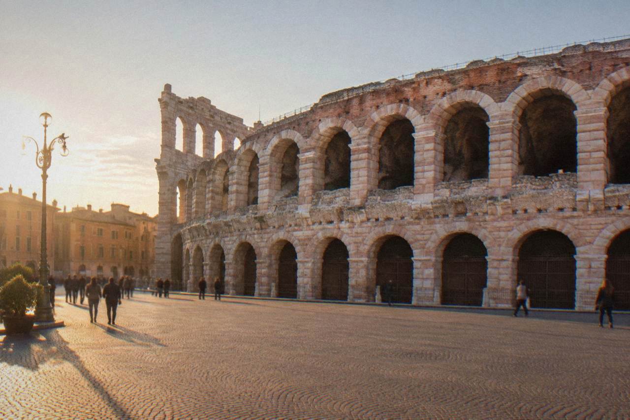 The Roman Arena of Verona seen from Piazza Bra at golden hour