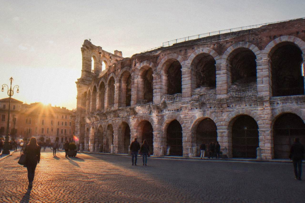 The Roman Arena of Verona seen from Piazza Bra at golden hour