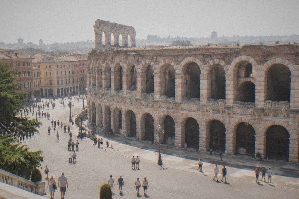 The Verona Arena amphitheatre seen from Piazza Bra on a bright morning